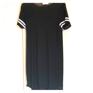 Cute baseball style dress with mesh details.